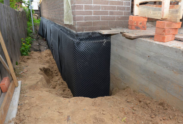 Happy homeowners after waterproofing job in Rock Hill